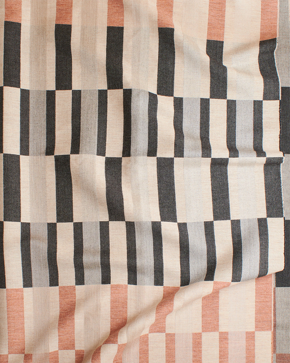 Block Tile Wool Throw in Charcoal and Peach