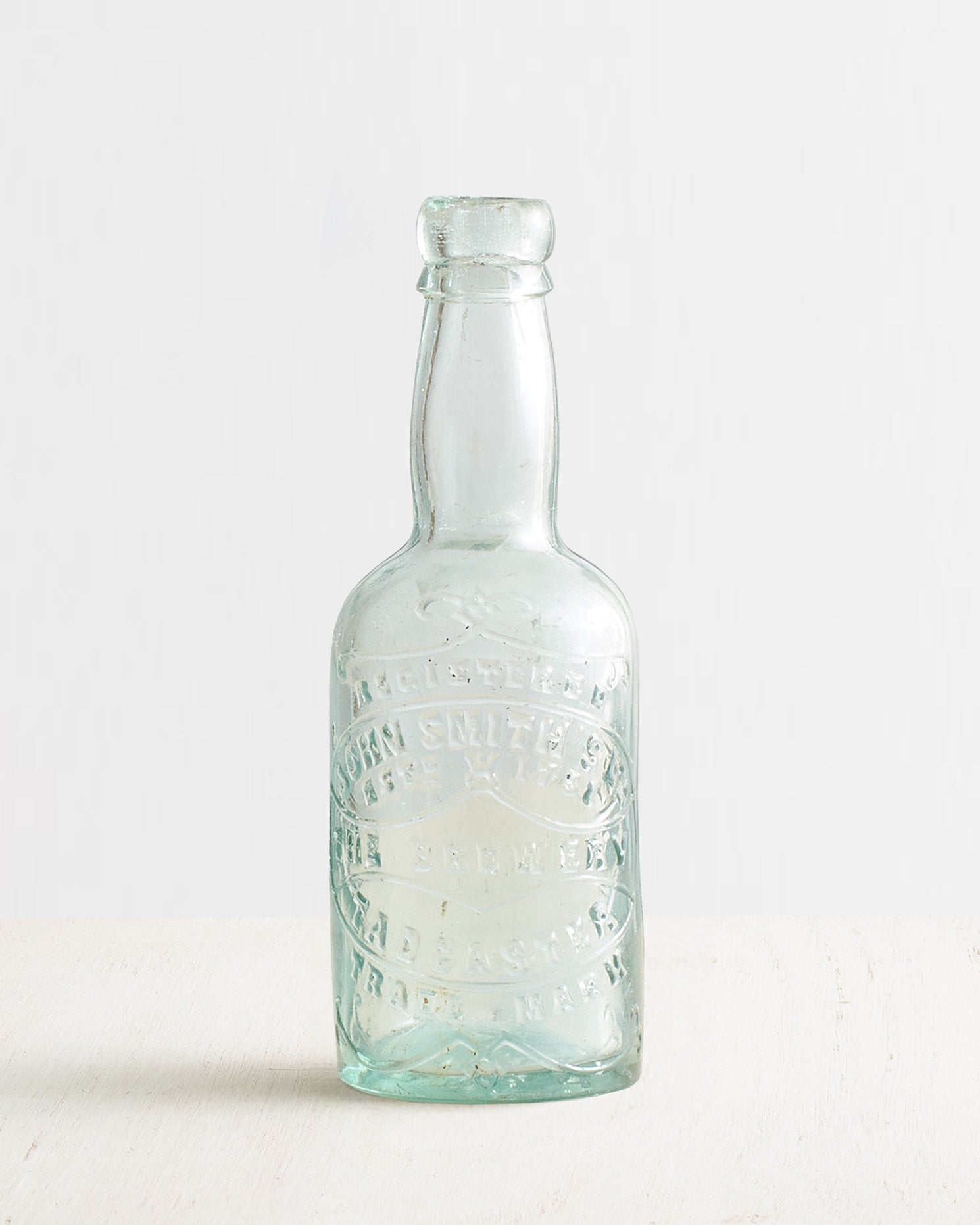 Vintage Medium John Smiths Round Glass Bottle Vase