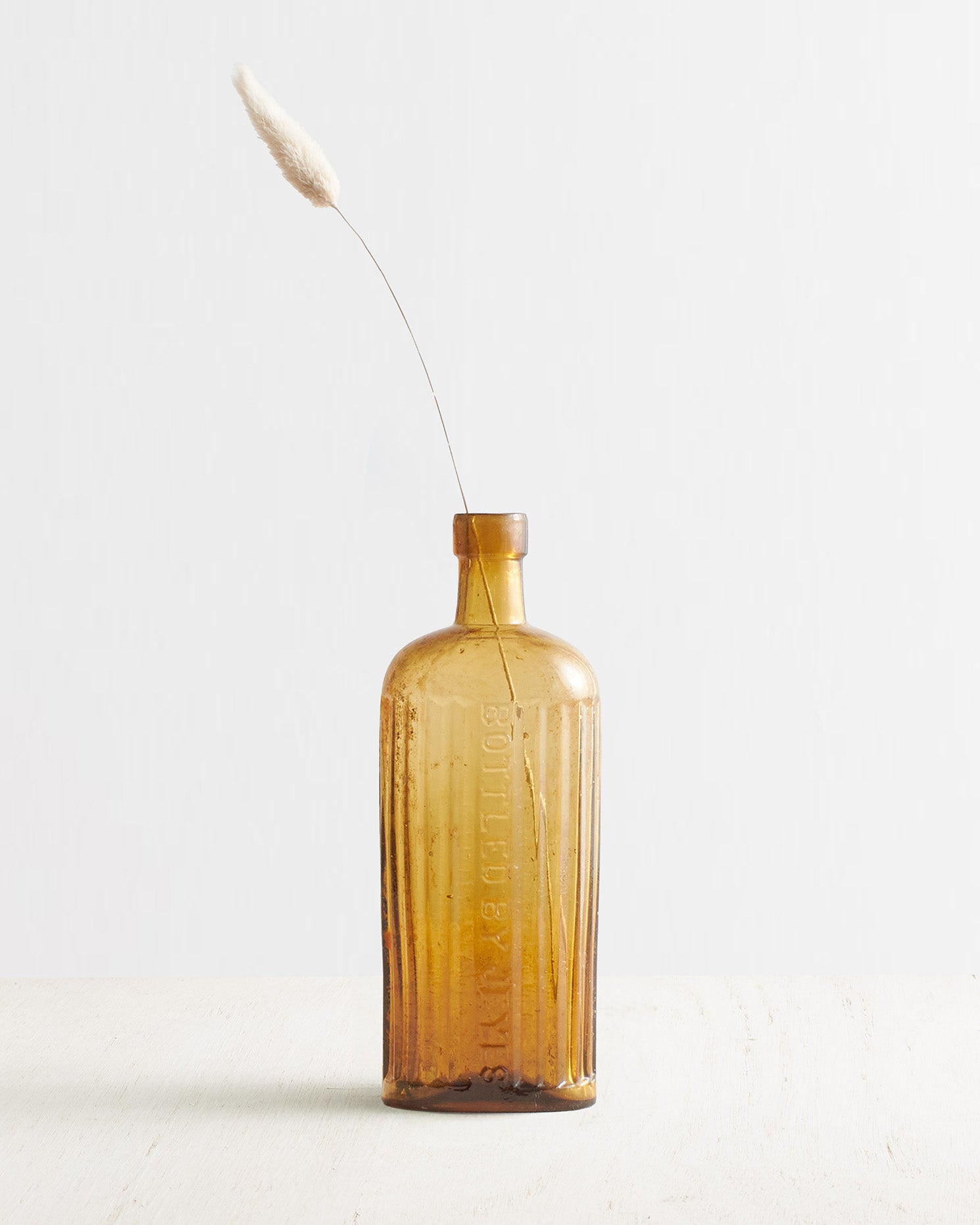 Vintage Medium Ribbed Glass Bottle Vase in Amber
