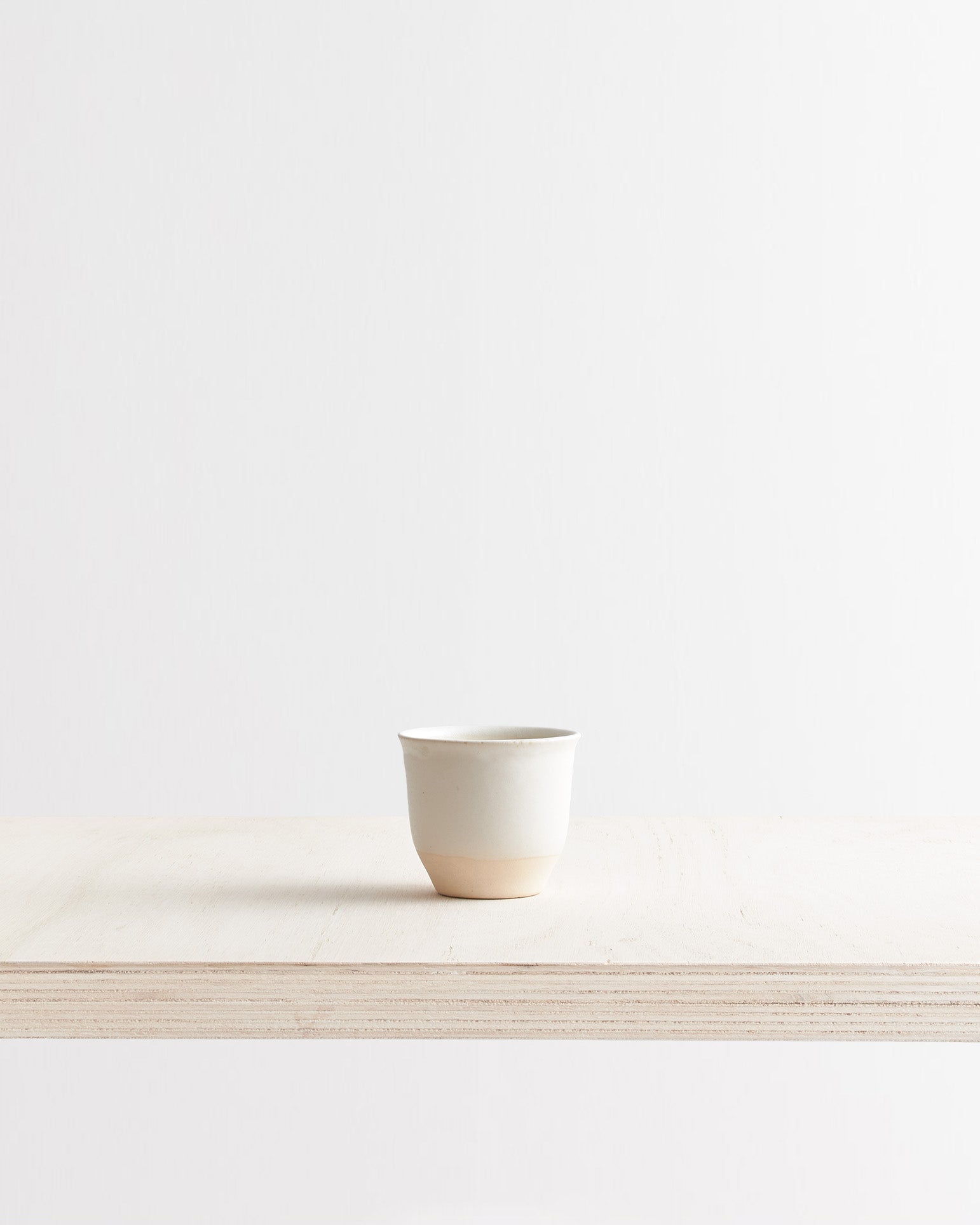Handleless Stoneware Cup in White Glaze