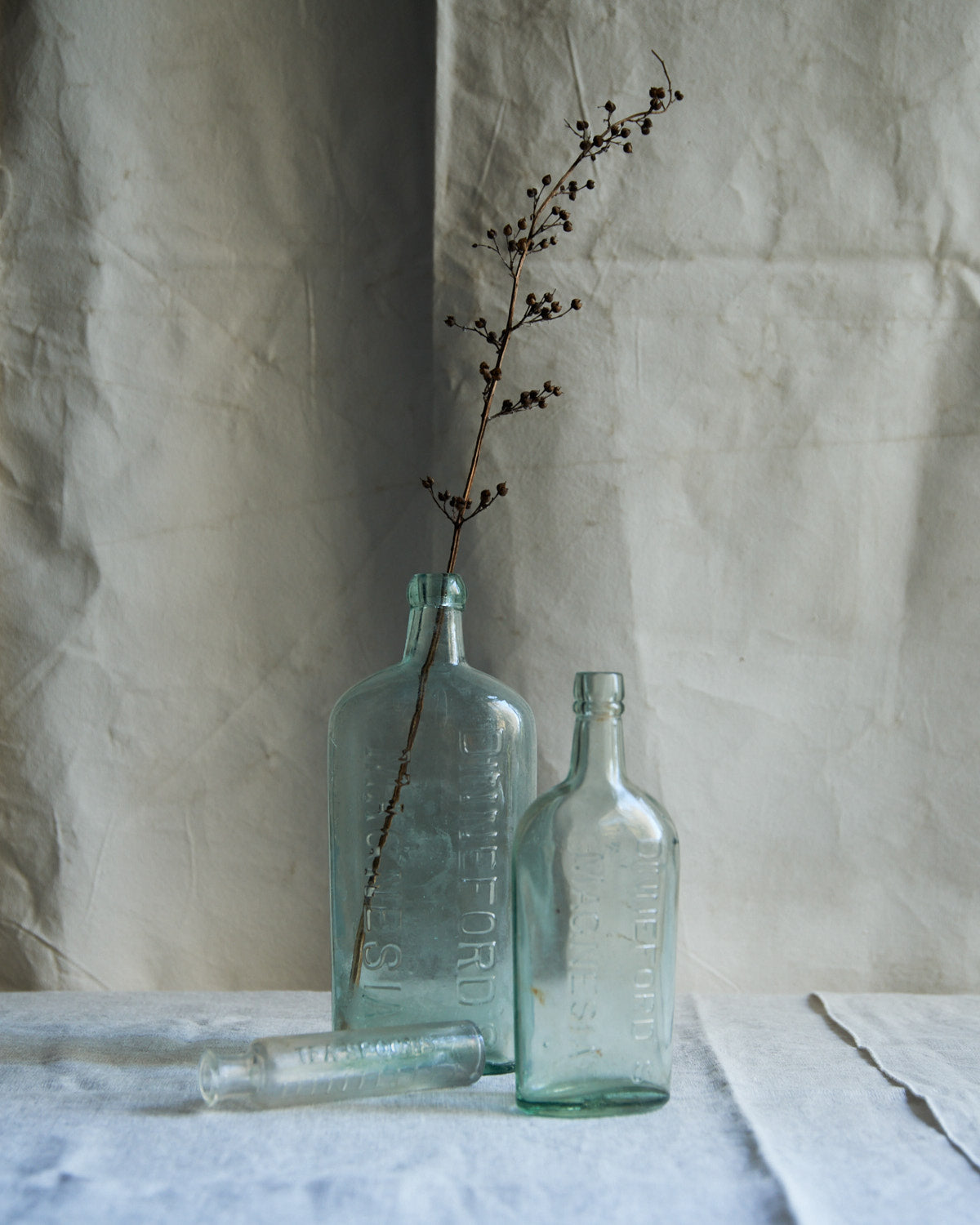 Vintage Medium Dinnefords Magnesia Glass Bottle Vase